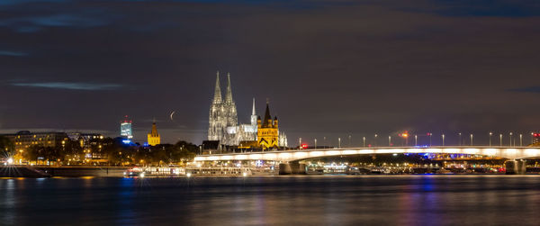 Illuminated buildings in city at night