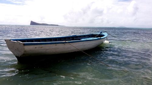 Boats moored in sea