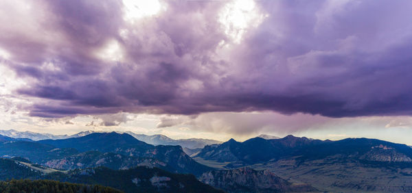 Scenic view of mountains against sky during winter