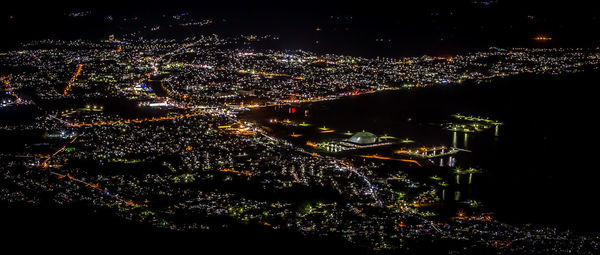 Illuminated cityscape at night