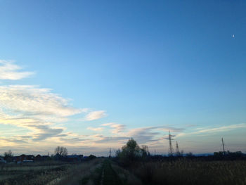 Scenic view of landscape against sky at dusk