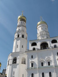 Low angle view of building against blue sky