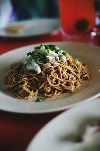 Close-up of noodles in bowl on table