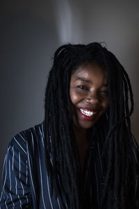 Portrait of smiling young woman