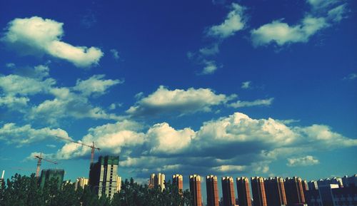 Low angle view of city against sky