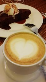 Close-up of coffee cup on table