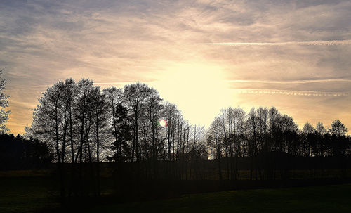 Scenic view of landscape against sky during sunset