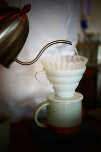 Close-up of coffee served on table