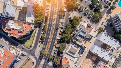 High angle view of street amidst buildings in city