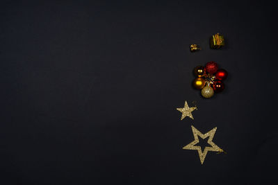 High angle view of christmas decoration against black background