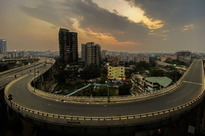 High angle view of buildings against sky during sunset