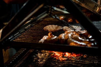 Close-up of meat on barbecue grill