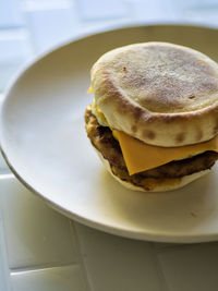 High angle view of burger in plate on table