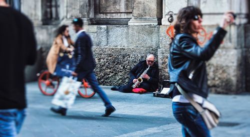 People on street in city