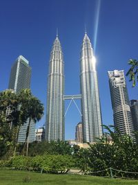 Low angle view of modern buildings against sky