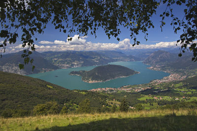 Scenic view of landscape and mountains against sky