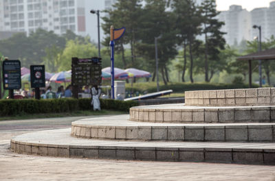 Empty steps against trees at sangdong lake park