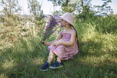 Woman wearing hat on field