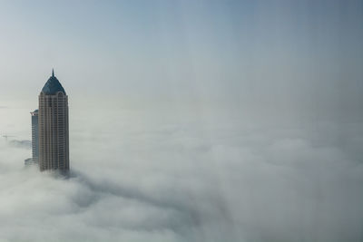 Modern buildings in city against sky