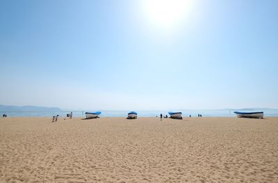 Scenic view of beach against clear sky