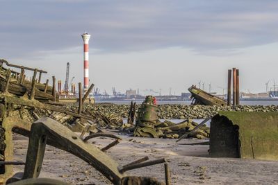 Two old ship wrecks near a lighthouse in hamburg