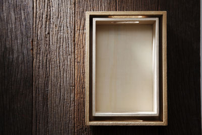 Close-up of empty wooden door