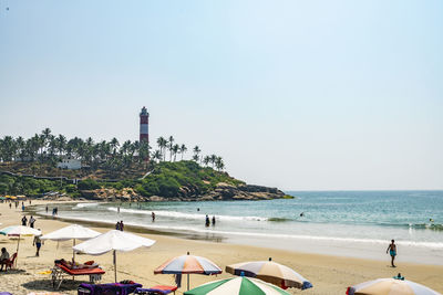 Scenic view of kovalam beach against clear sky