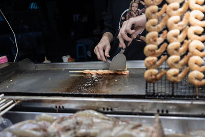 Man preparing food on table