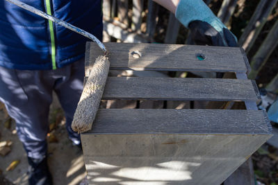 Low section of man standing on steps