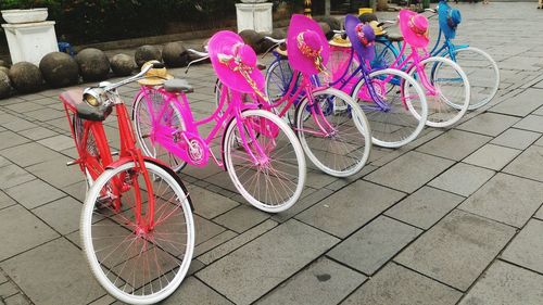 Bicycles on pink bicycle in city