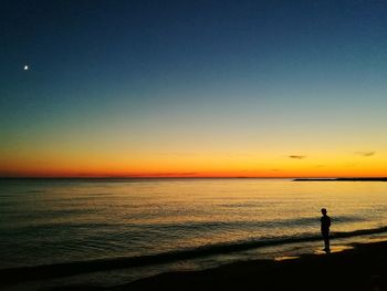 Scenic view of sea at sunset