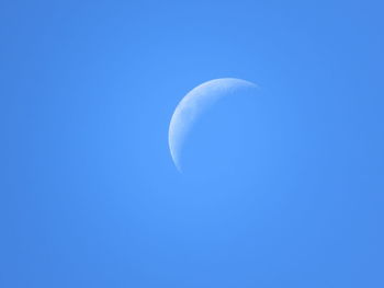 Low angle view of moon in sky