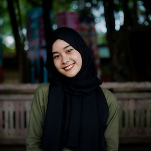 Portrait of young woman wearing hijab