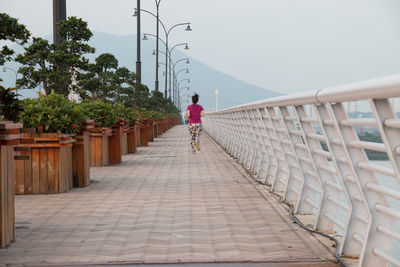 Full length of woman running