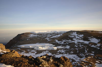 Scenic view of sea against sky during winter