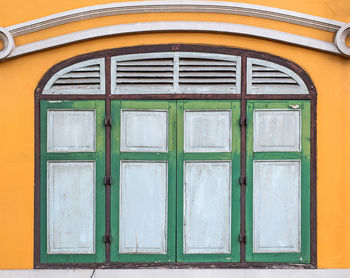 Closed window of old building