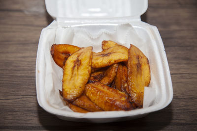 Close-up of food served on table