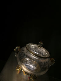 Close-up of glass over white background