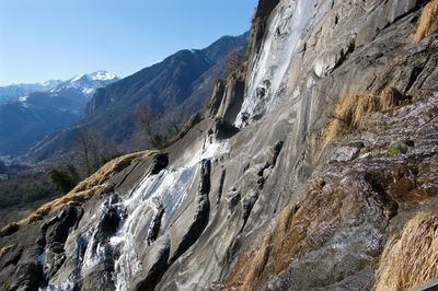 Panoramic view of snowcapped mountains against sky