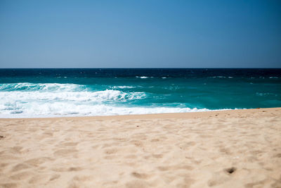 Scenic view of sea against clear sky