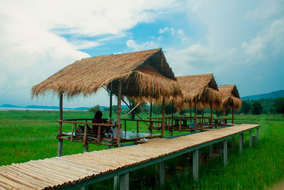 Built structure on beach against sky