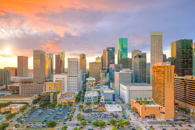 High angle view of buildings against sky during sunset