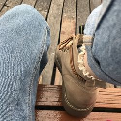 Low section of person wearing shoes