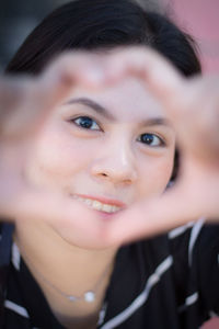 Close-up portrait of smiling woman