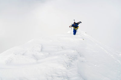 Snowboard and freeride on dolomites and snowpark, climbing the mountain