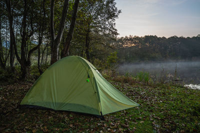 Tent by the lake in the morning
