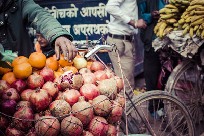 Various fruits for sale at market stall