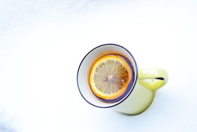 Close-up of drink against white background