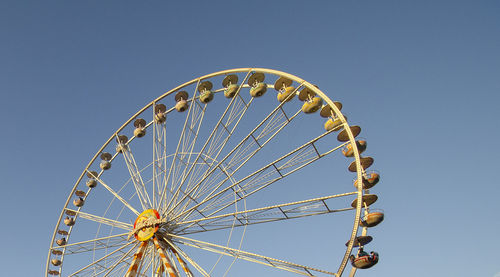 Blue sky ferris wheel