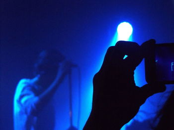 Close-up of hand holding illuminated light painting